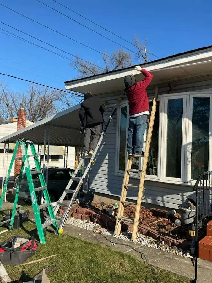 Restoration crew performing exterior repair in Whitefish