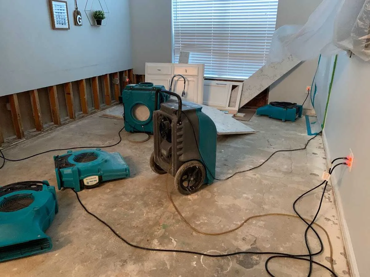 Dehumidifier in flood-cut room for Water Damage Restoration in Whitefish